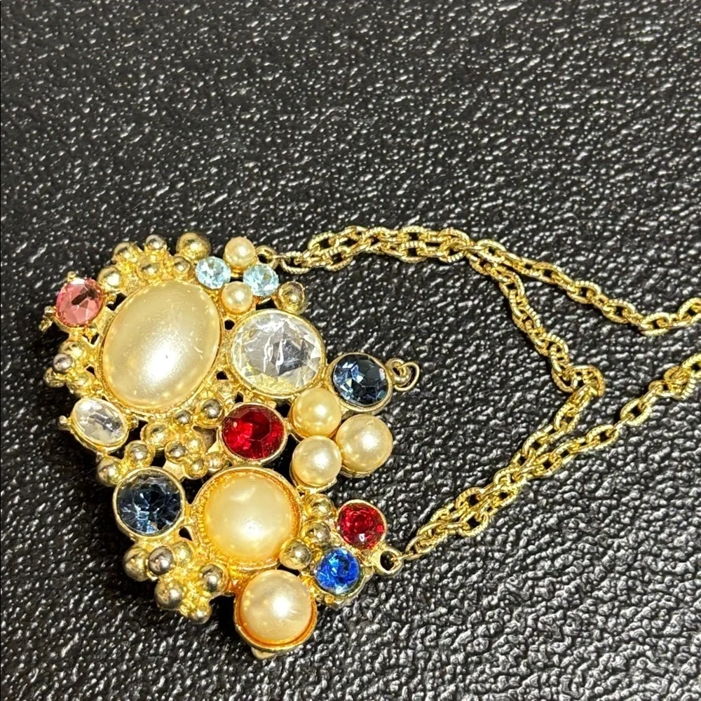 Elegant Gold and Multicolor Gemstone Brooch